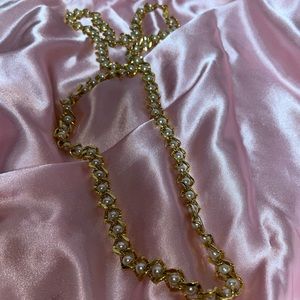 Beautiful gold plated necklace with white pearls infused